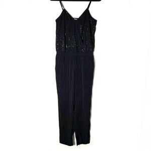 Express black sequin straight leg jumpsuit size 6 B53
